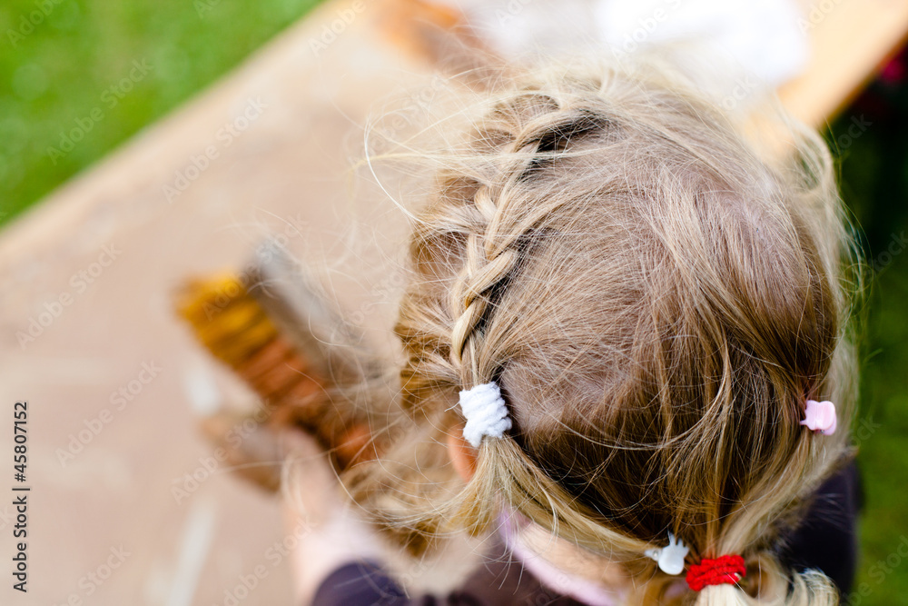 Obraz premium Mädchen mit Zöpfen