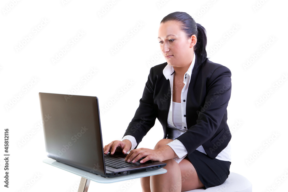 Brunette business woman working on the laptop Brunette business woman working on the laptop