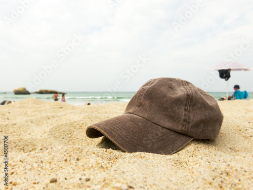 Cap on a beach