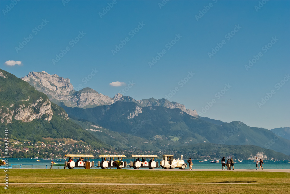 Annecy lake and turistic train, France