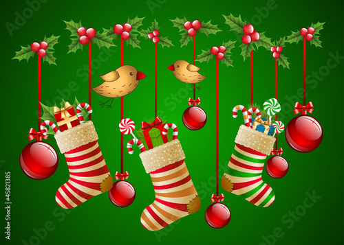 Hanging christmas socks with present and balls.