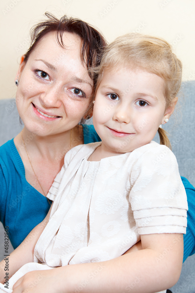 Portrait of mother with small daughter together Portrait of mother with small daughter together