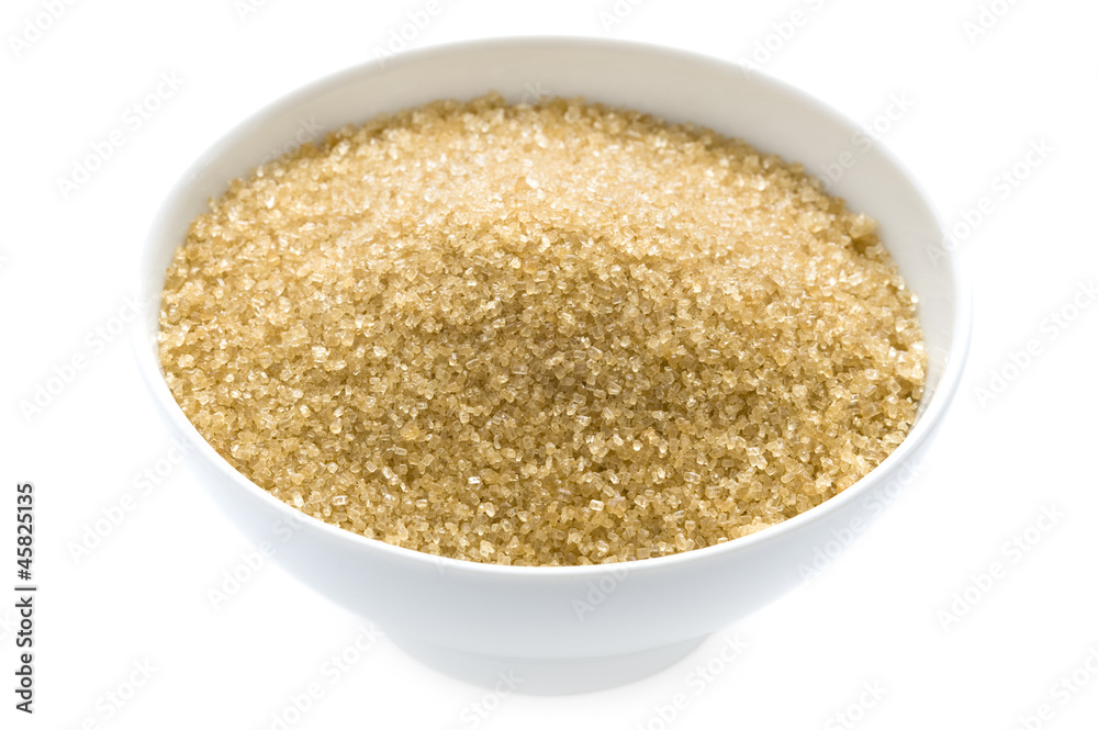 demerara sugar in a bowl isolated