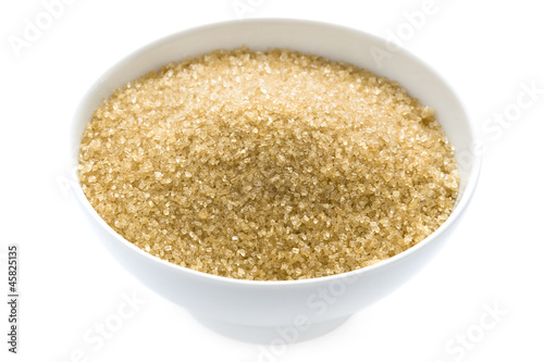 demerara sugar in a bowl isolated photo