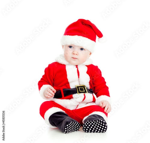 funny little kid in Santa c...