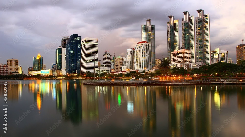 Modern city in the evening with clouds and light Modern city in the evening with clouds and light