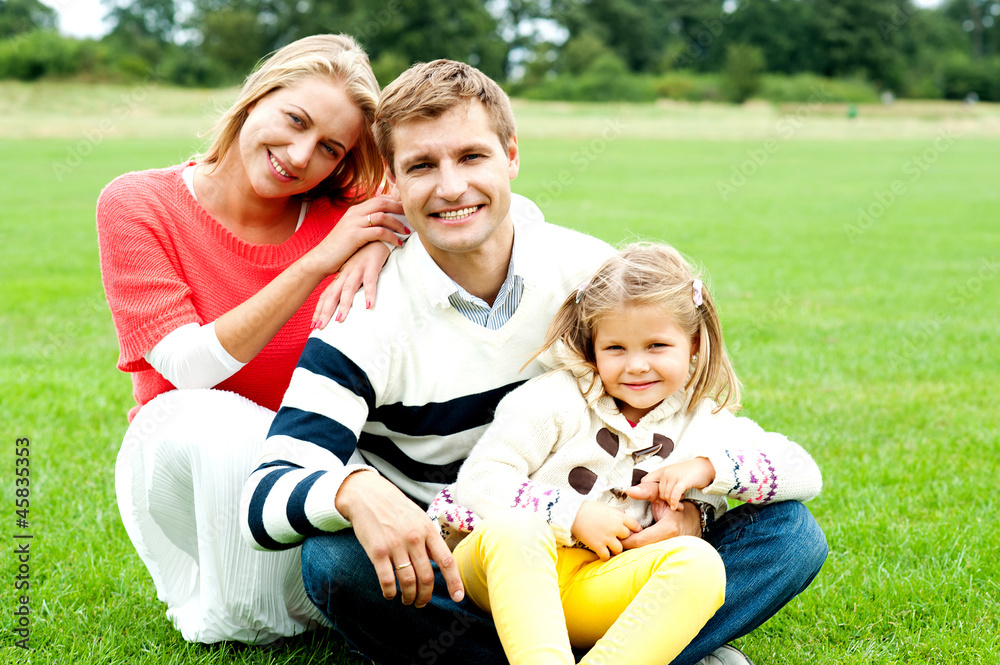 Outdoor happy caucasian family relaxing