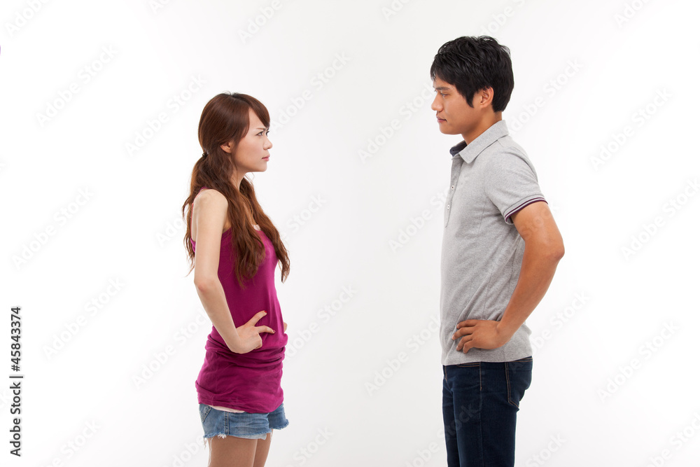Asian couple fight each other isolated on white background. Asian couple fight each other isolated on white background.