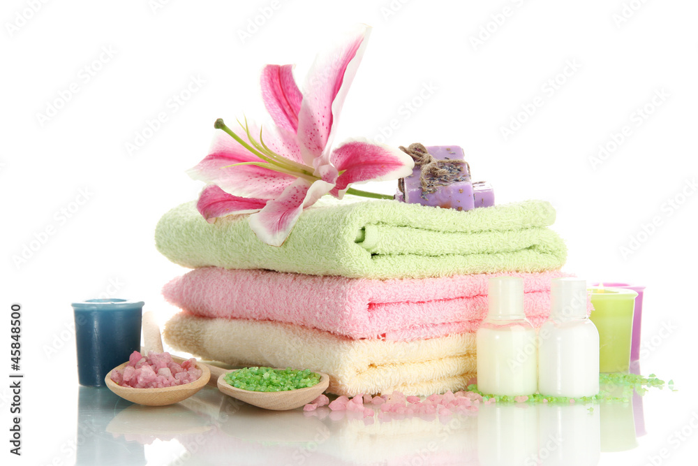 towels with lily, aroma oil,  candles, soap and sea salt
