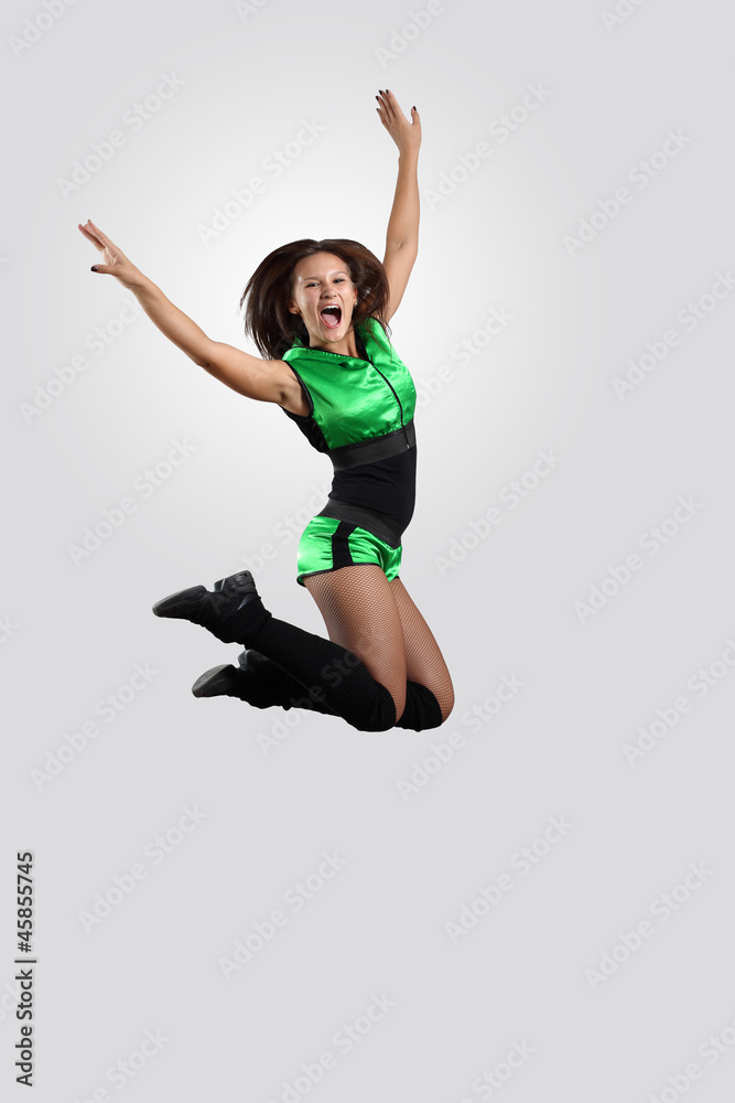 Young female dancer against white background Young female dancer against white background