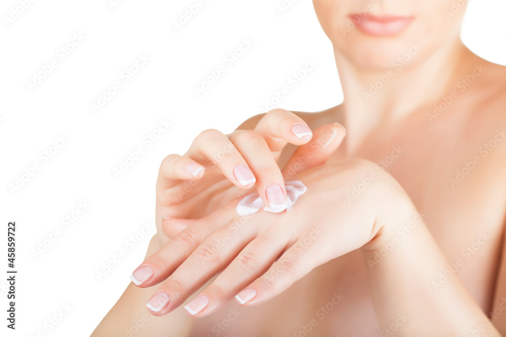 Fototapeta premium Cream on the women hand
