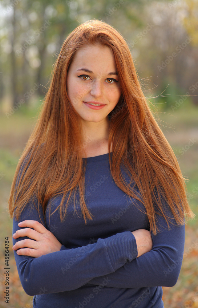Fototapeta premium Red Haired Girl Portrait smiling