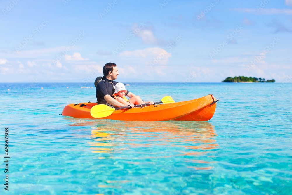 Father and daughter kayaking