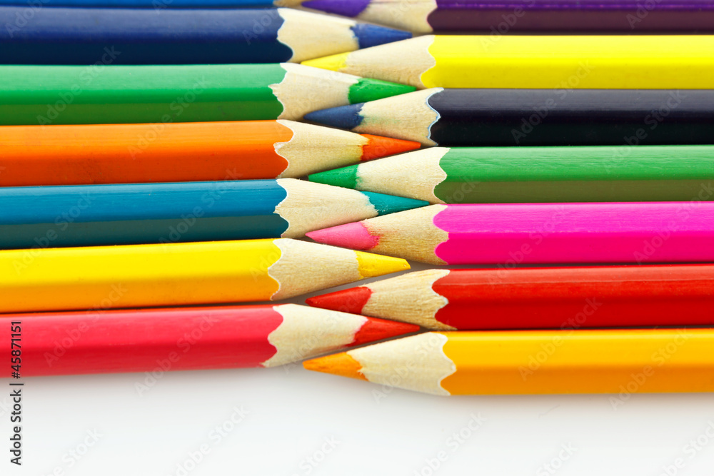 Row of colored pencils, on white background Row of colored pencils, on white background