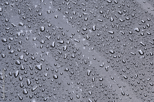 Waterdrops on a polished lacquer surface