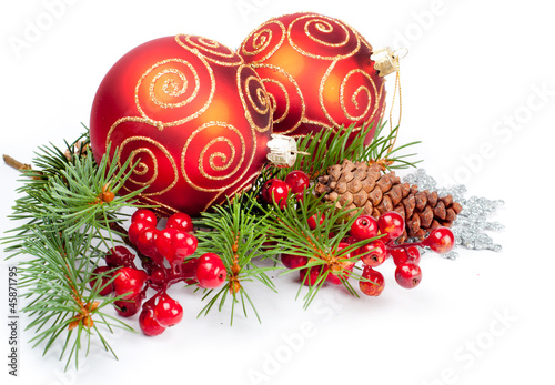 Two christmas balls with pine and decorations
