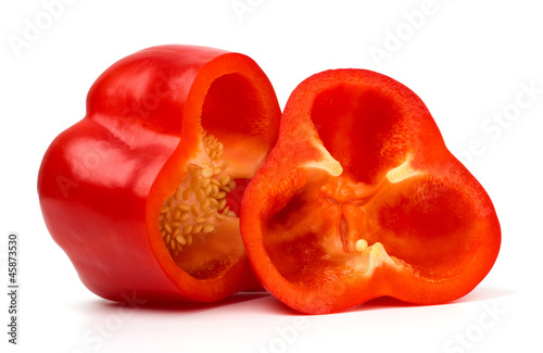 Cut sweet peppers isolated on white
