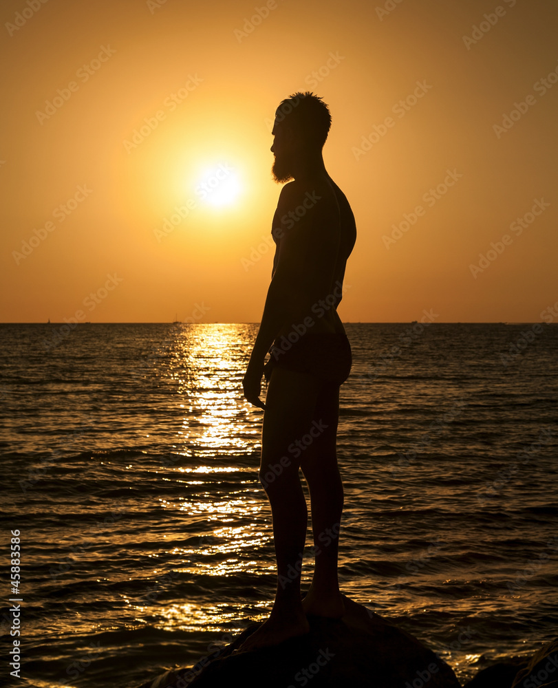 Silhouette of man in sunset