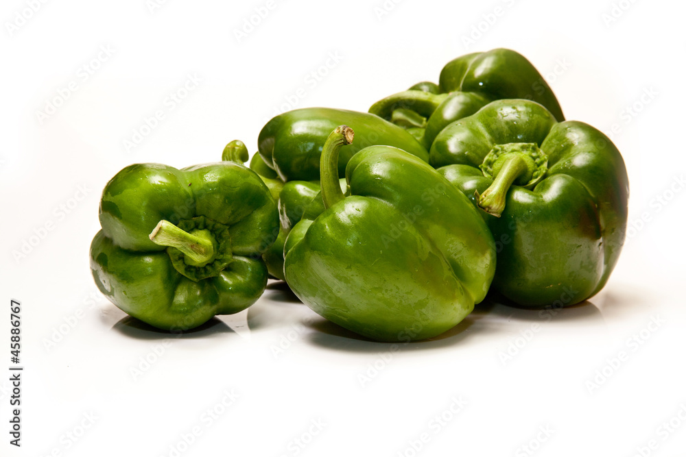 Bell peppers isolated on a white studio background. Bell peppers isolated on a white studio background.