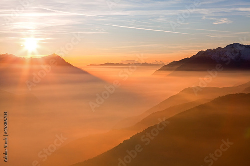 tramonto sulle alpi