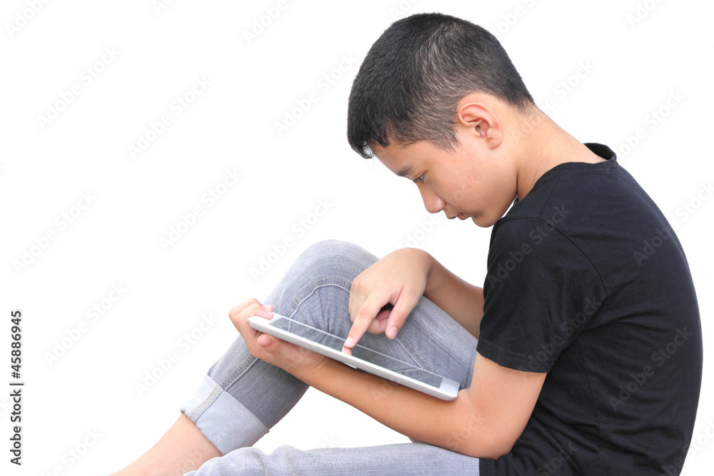 Asian boy with electronic tablet Asian boy with electronic tablet
