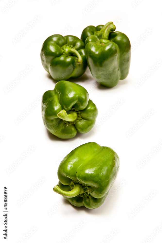 Bell peppers isolated on a white studio background. Bell peppers isolated on a white studio background.