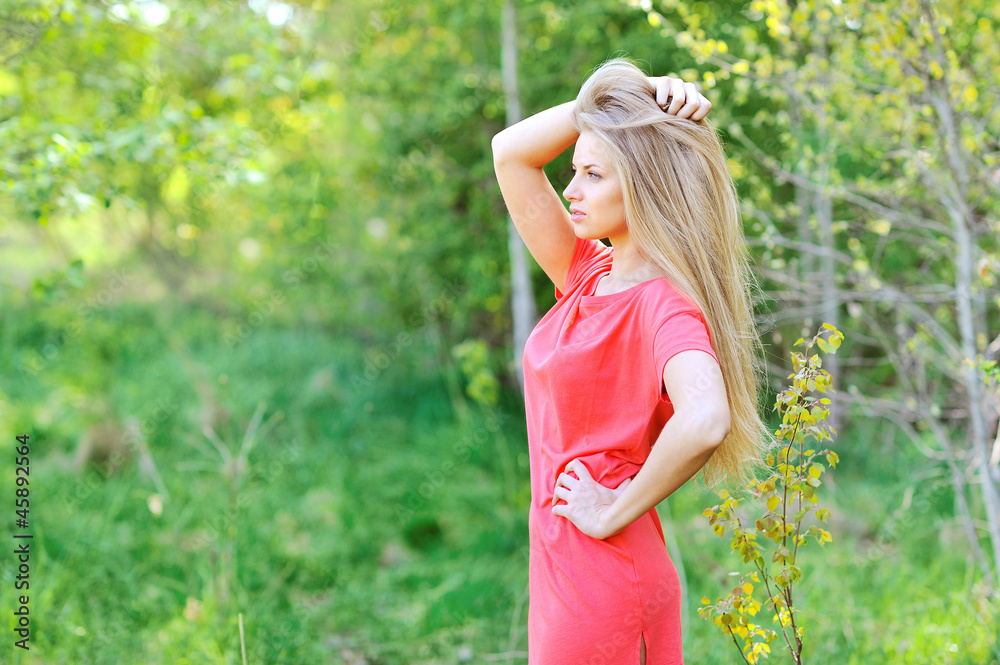 Confident lady enjoying nature in the meadow Confident lady enjoying nature in the meadow