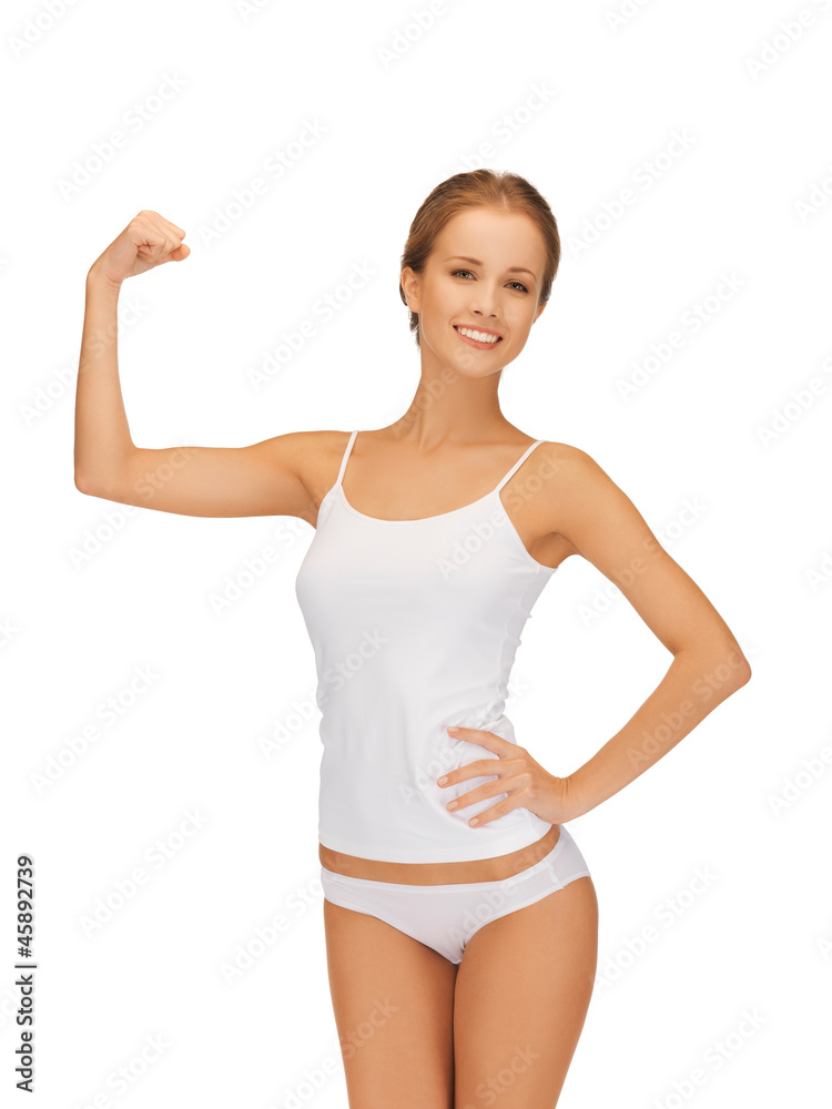 woman in cotton undrewear flexing her biceps woman in cotton undrewear flexing her biceps