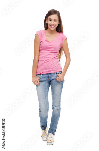 Attractive young woman standing © pikselstock