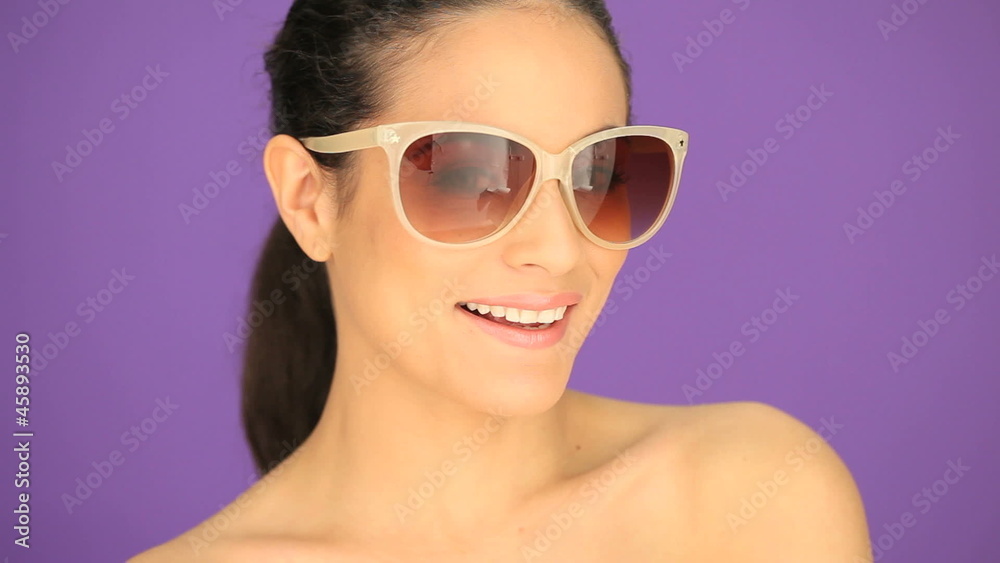 Smiling brunette in sunglasses Smiling brunette in sunglasses