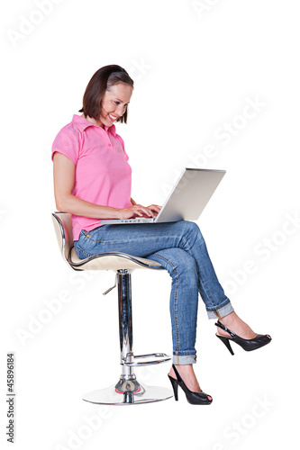female sitting on chair and working