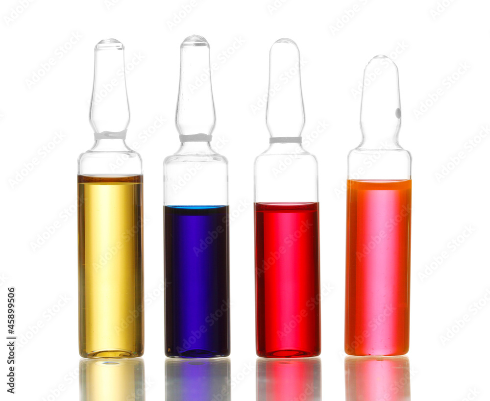 medical ampules with bright liquid, isolated on white medical ampules with bright liquid, isolated on white