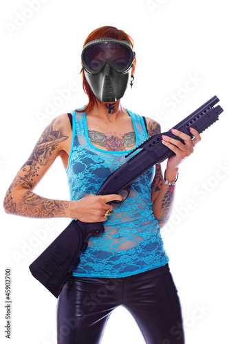 A punk girl with a shotgun photo