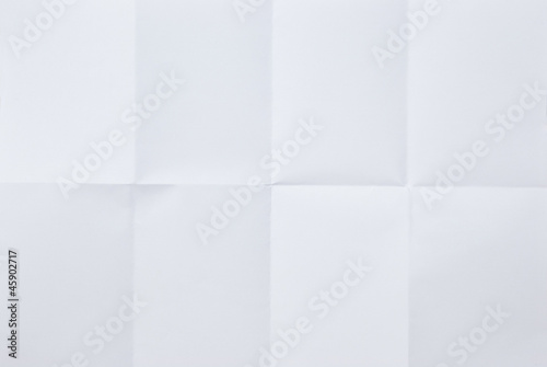 white sheet of paper folded in eight photo