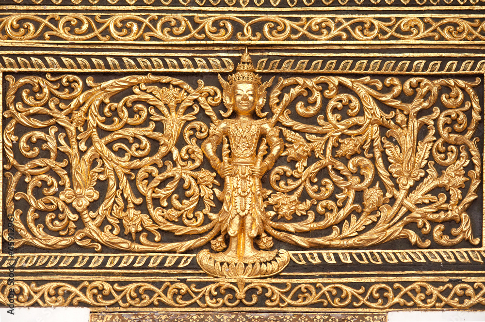 Thai art on the wall in temple.