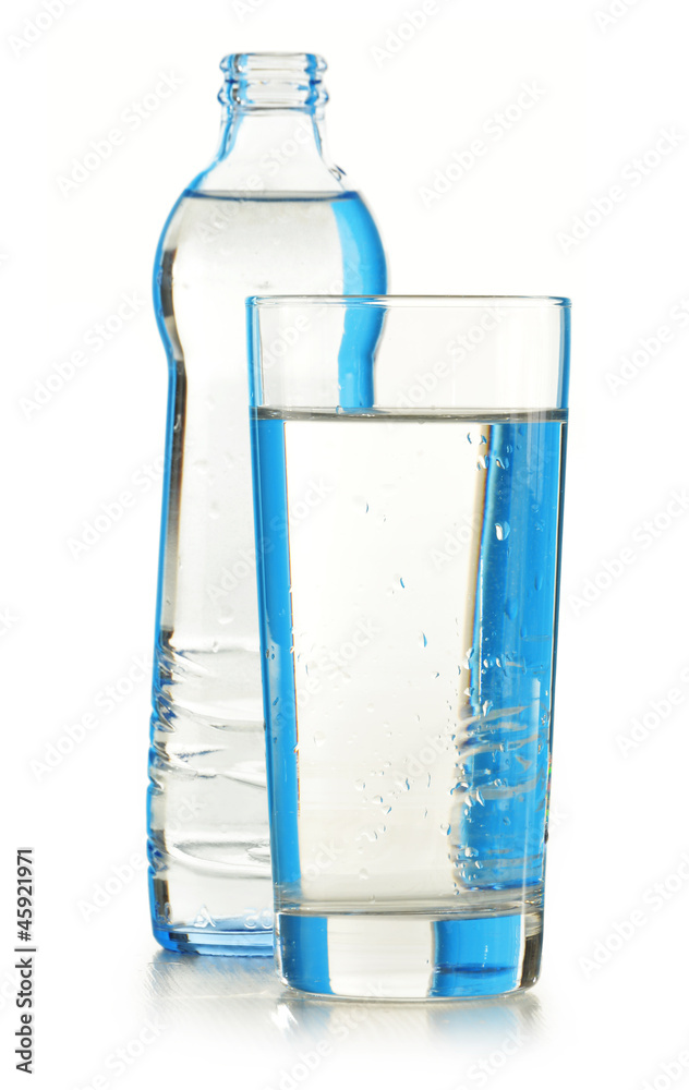 Glass bottle of mineral water isolated on white Glass bottle of mineral water isolated on white