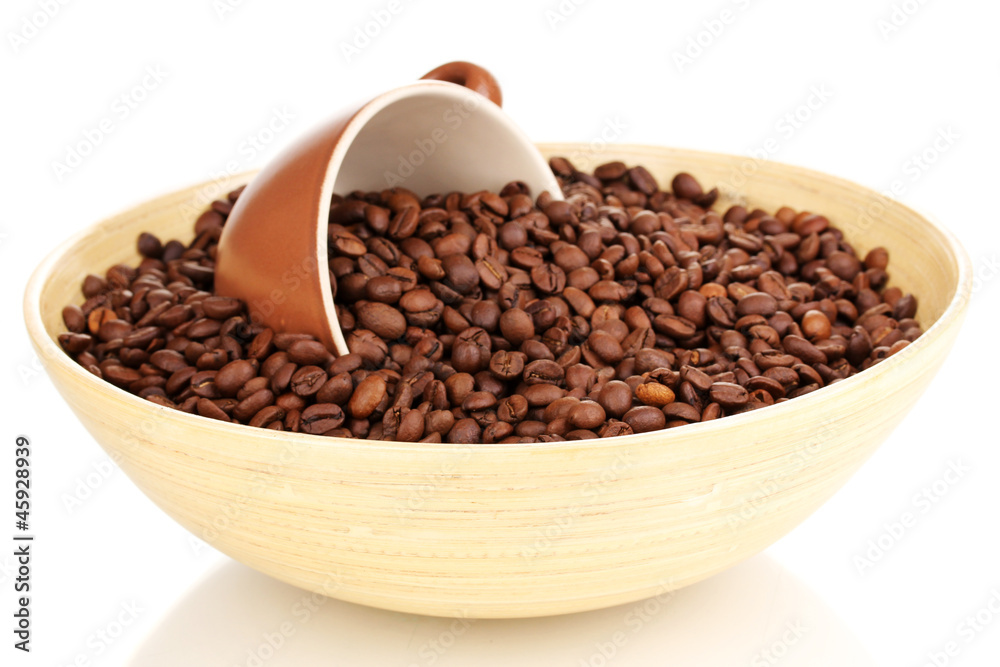 Coffee beans in bamboo bowl with cup isolated on white Coffee beans in bamboo bowl with cup isolated on white