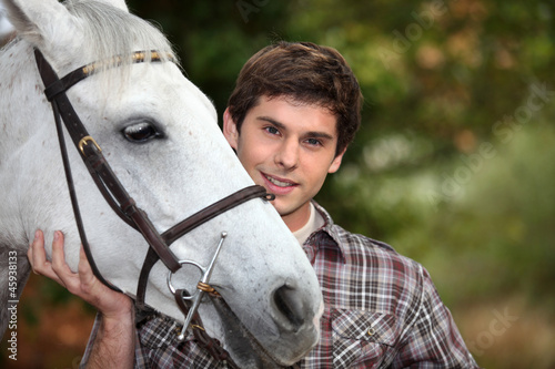 Teen with white horse
