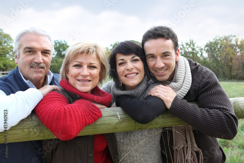 Family stood by fence