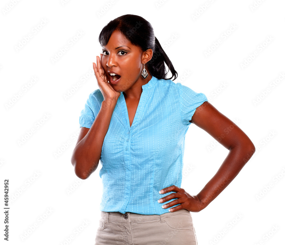 Surprised young woman looking at you - copyspace Surprised young woman looking at you - copyspace