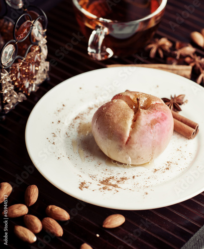 gourmet baked apple with tea and almonds