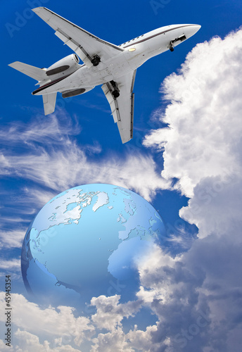 Airplane flying around the globe