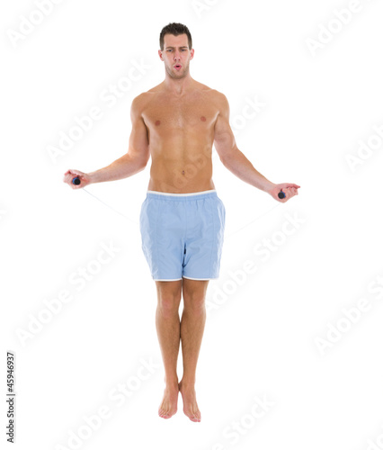 Male athlete using jumping rope