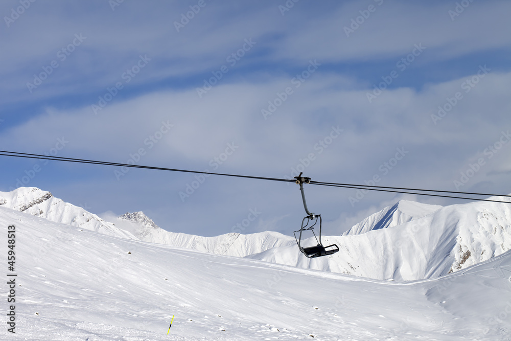 Chair lift at ski resort Chair lift at ski resort