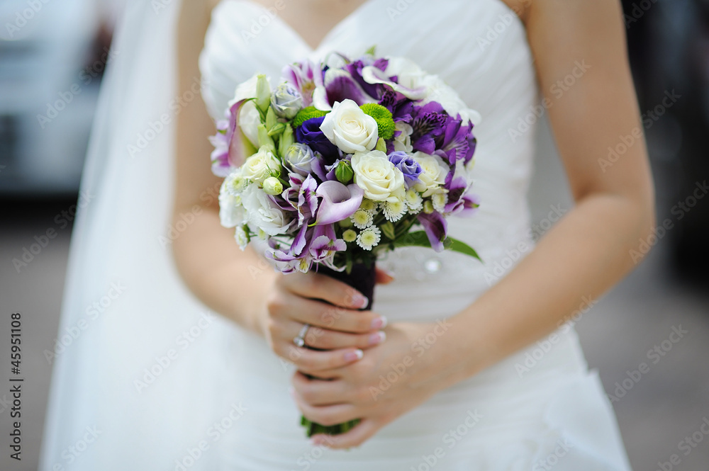 wedding bouquet of purple and white flowers