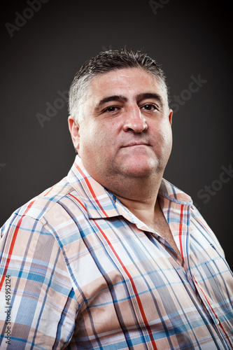 Принти на полотні Fat man posing in studio