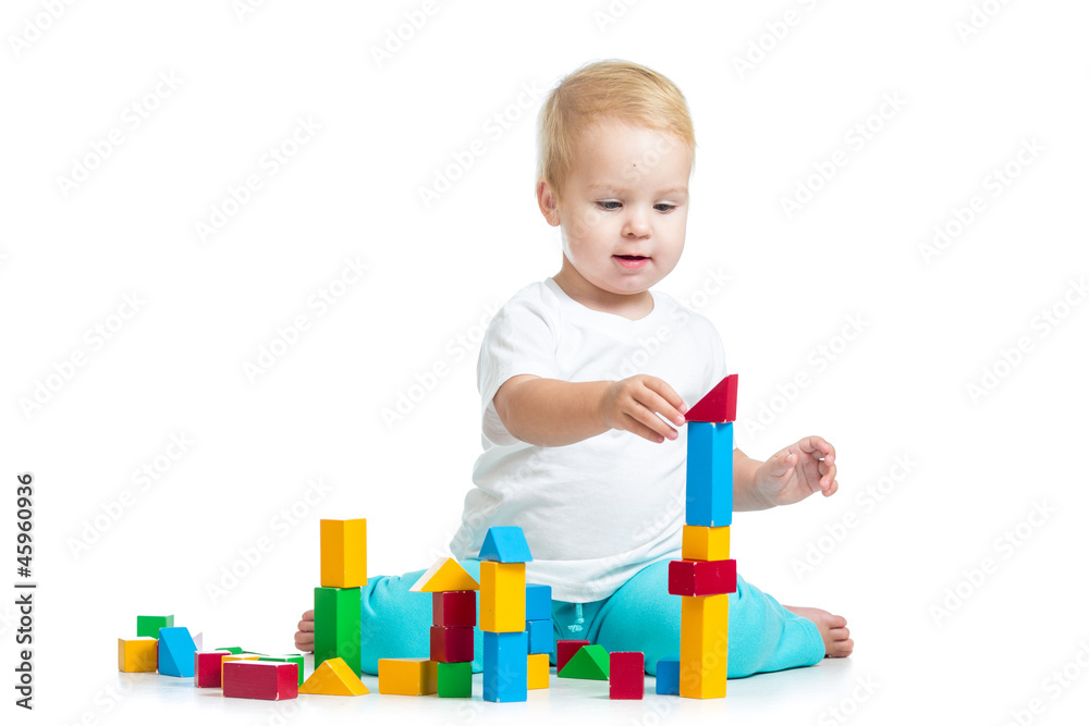 kid playing toy blocks isolated on white background kid playing toy blocks isolated on white background