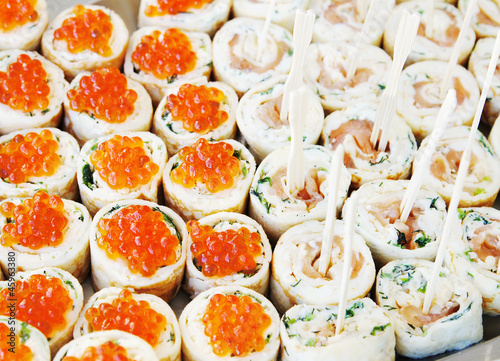 Many rolls on the plate photo