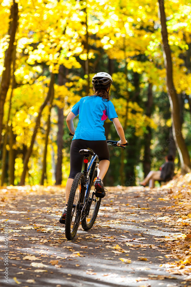 Fototapeta premium Girl biking