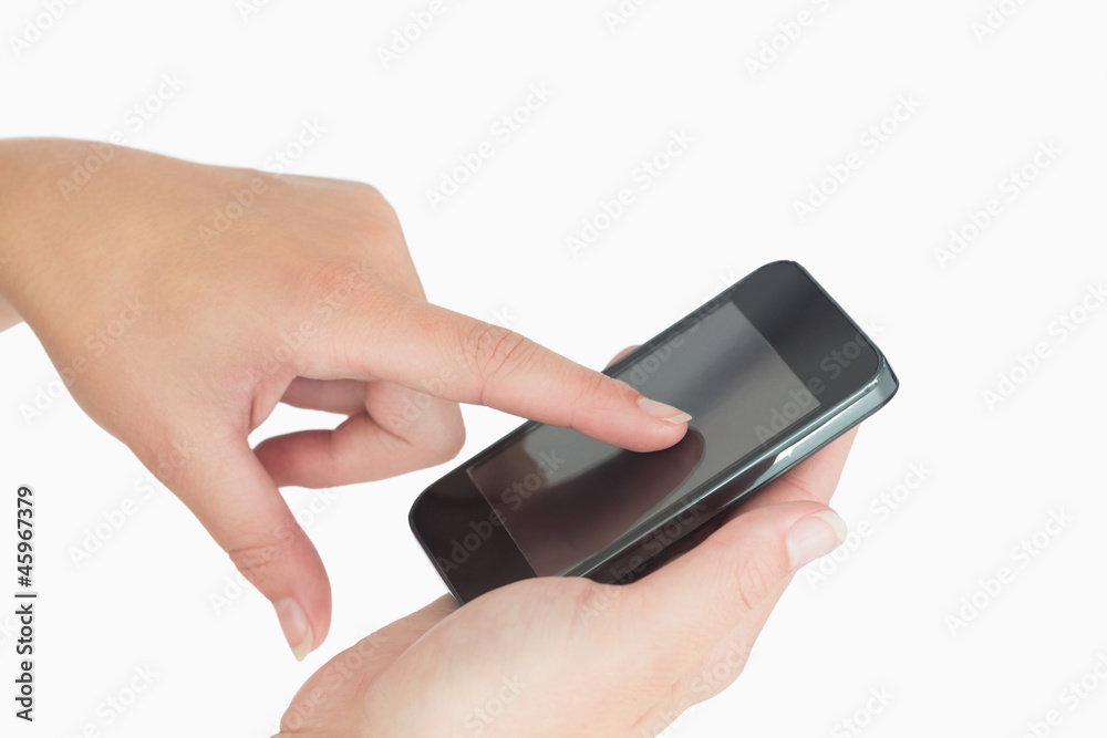 Hand touching a smartphone Hand touching a smartphone